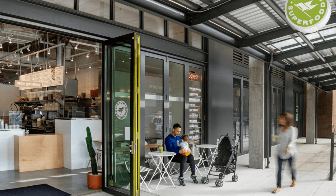 People walking outside of the Pearl District Kure location